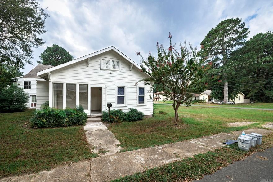 This property offers incredible versatility with a two-bedroom, one-and-a-half-bath main house and a separate one-bedroom, one-bath guest apartment, all situated on an oversized lot just minutes from Henderson State University. The main house has been thoughtfully updated with brand-new LVP flooring throughout, an updated bathroom featuring a beautiful walk-in tile shower, a spacious primary suite closet, and a newer HVAC unit and roof for peace of mind. The guest apartment provides excellent income potential, perfect for student housing, a long-term rental, or a private space for guests. This unique property combines comfort, convenience, and investment opportunity in one exceptional package.