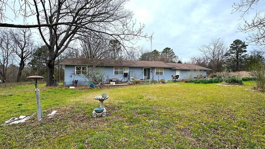 This property has the potential to have multiple homes or just your dream home. This 3 bedroom 2 bath home sits pretty on 35 acres m/l. Old turkey barns, not in use, are located on property. Home and turkey barns are sold As Is.