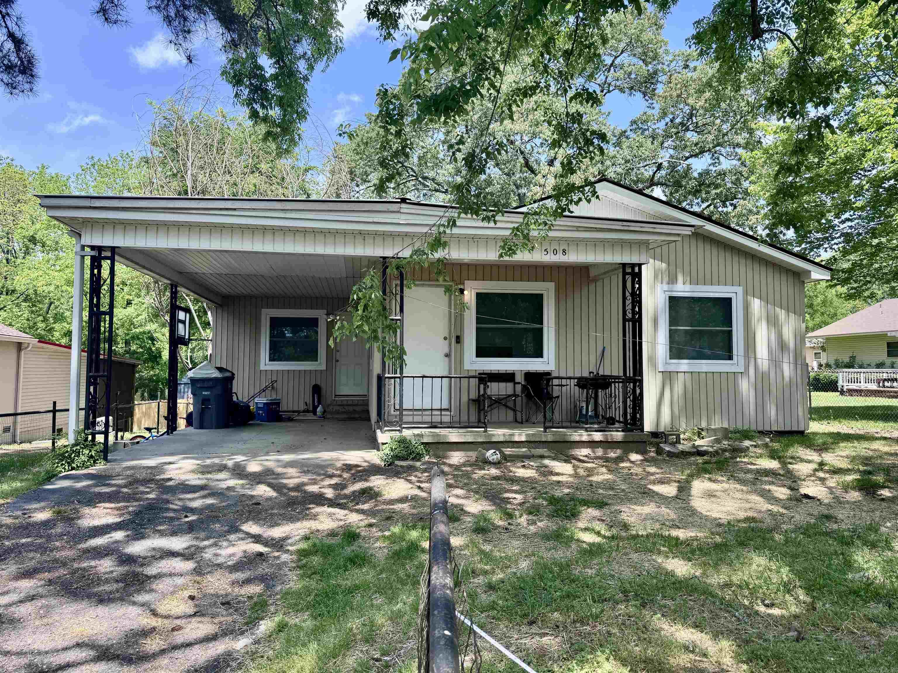 This adorable home is full of charm and rental potential! Just minutes from shopping, dining, and the famous Oaklawn Racing & Gaming complex, it’s the perfect location for full-time living or a fantastic investment opportunity. Recent upgrades include a brand new roof (2023) and all new energy-efficient windows (2023), giving peace of mind to future owners and reducing utility costs. Whether you're looking for your next home, a weekend getaway, or a high-demand rental, this little gem checks all the boxes! Don't miss out—schedule a showing today!