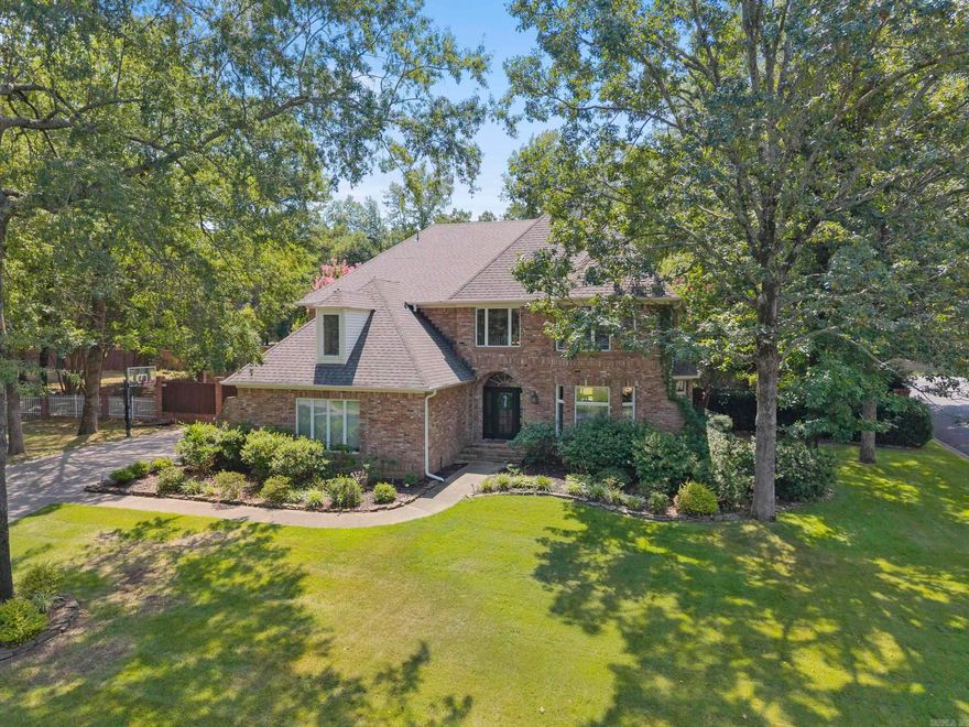 Custom home surrounded by mature trees and privacy in sought-after Pippinpost neighborhood! The backyard retreat features an in-ground pool with an 8' deep end, a covered stamped concrete patio, and historic brick walkway. The main floor showcases a two-story foyer with a balcony, hearth room, large kitchen with island seating, oversized dining room with a tray ceiling that easily seats 12+, as well as two sets of French doors leading into a second living room plus space for an additional eating area or game room. A dedicated laundry room with spacious pantry and a powder room round out the main floor. The second floor features the recently remodeled primary ensuite with a tray ceiling as well as a bathroom with a quartz dual vanity, soaking tub, and tile shower with a seat and shampoo nook. Additionally on the second floor are 3 sizable bedrooms and 2 full bathrooms including a second ensuite! The flooring throughout the main living areas and bedrooms was recently upgraded to a gorgeous, engineered hardwood which is easy to care for. Neutral paint throughout. Roof was new in 2022. Please reach out for additional information or to schedule a tour of this beautiful home!