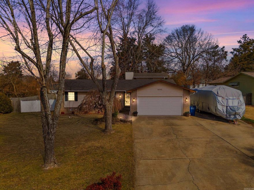 Situated in the desirable Indian Creek Subdivision, this 4-bedroom, 2.5 bath home offers a functional layout and an excellent location close to Cooper Park, schools, and shopping. The spacious living room features a cozy brick fireplace and plenty of natural light. The kitchen provides abundant cabinet space and opens to the dining area, creating an easy flow for everyday living. The primary suite offers privacy and comfort, while the additional bedrooms provide flexibility for family, guests, or office use. A bonus room adds valuable extra space for a second living area, playroom, or hobby room. Outdoors, enjoy a fully fenced backyard with room to relax, entertain, or let pets play. The extra parking pad is ideal for a camper, boat, or 5th wheel, giving you the extra storage space many buyers are looking for. Complete with a 2-car garage and great curb appeal, this is a must-see home in a great neighborhood.