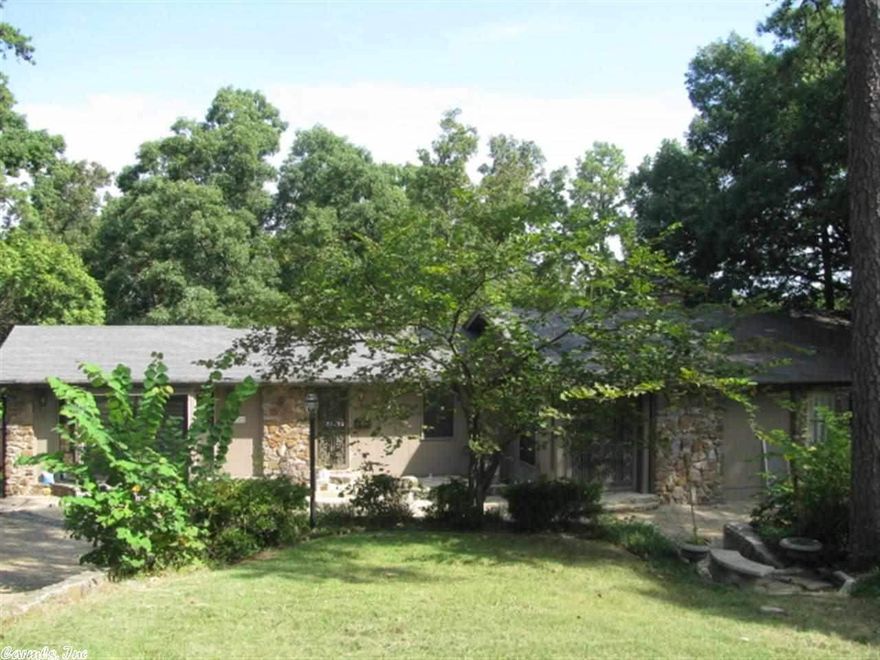 Country setting in the city, this gem in the rough is priced for immediate sale. Just west of River Ridge on Cantrell, this contemporary split to the rear has 3.6 acres with approximately 4700' of living space. Wonderful remodel opportunity for investors or individual looking for a deal!