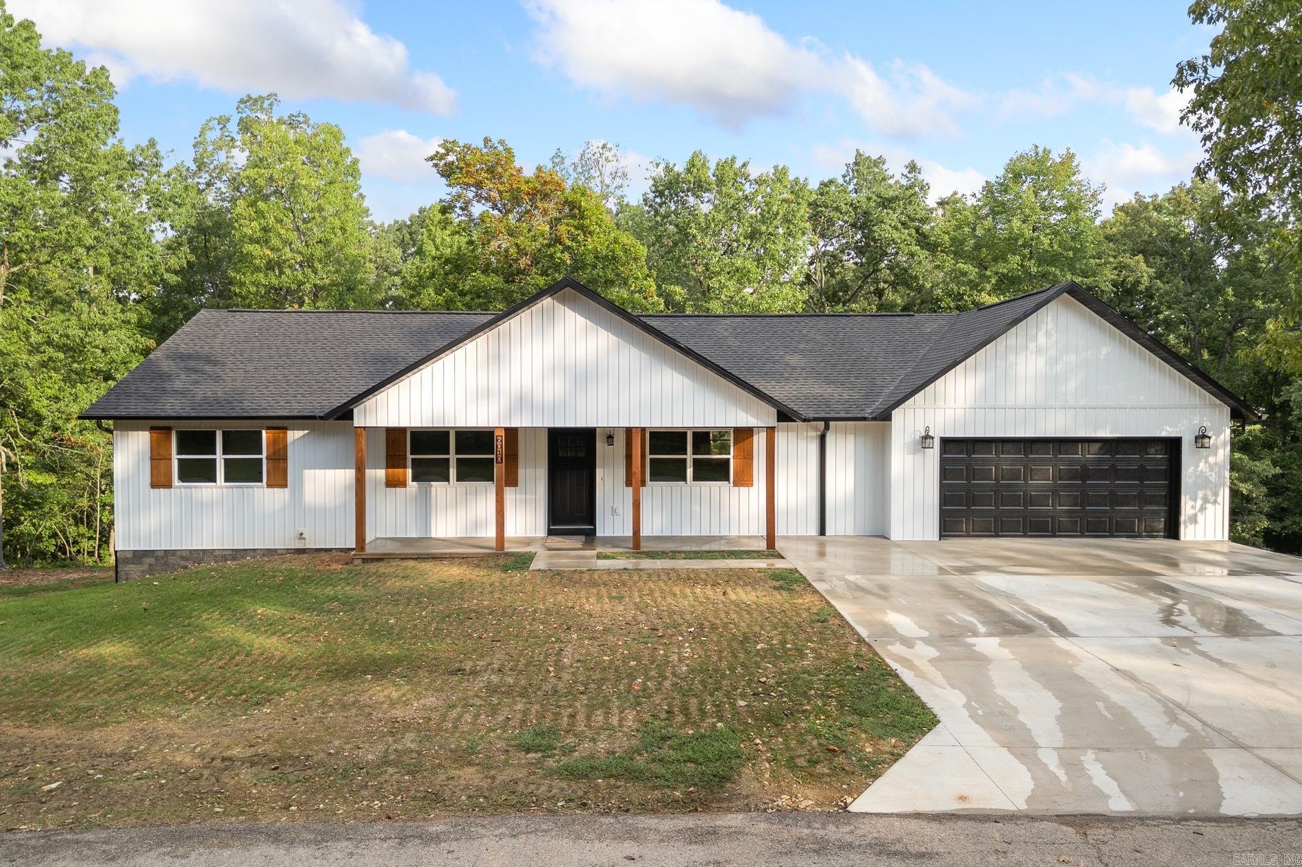 Beautiful new build. Cathedral ceilings, granite countertops, custom cabinetry, and a large covered deck perfect for entertaining. Enjoy a spacious layout, flex room, and option for an additional bedroom. Located in a quiet neighborhood just minutes from town.