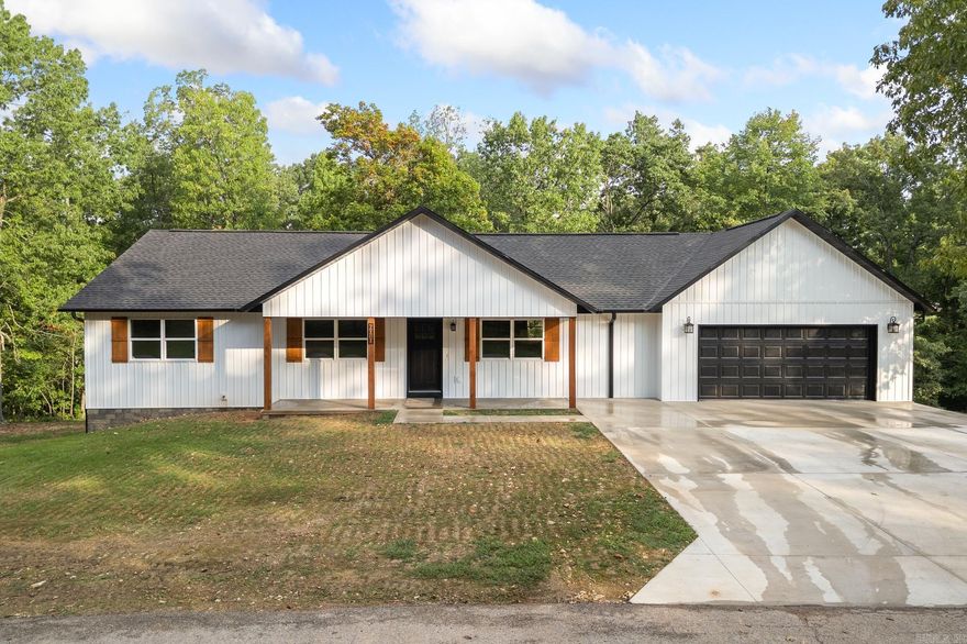Beautiful new build. Cathedral ceilings, granite countertops, custom cabinetry, and a large covered deck perfect for entertaining. Enjoy a spacious layout, flex room, and option for an additional bedroom. Located in a quiet neighborhood just minutes from town.