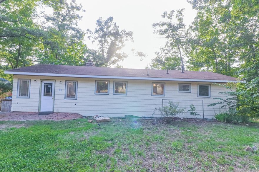 Welcome to Lake Life in the Heart of Ozark Acres! This charming and versatile property offers comfort, character, and incredible potential just steps from the water. Nestled on three lots totaling 1.41 acres, it's a rare find with space, views, and so many extras. The main home features approximately 1,200 square feet with 2 bedrooms, 1 bathroom, and a spacious bonus room perfect as a third bedroom, office, or hobby space. The sunroom offers peaceful lake views and a cozy place to unwind year-round. Also included is a tiny home with electricity, water, a toilet, and washer/dryer connections. The upstairs has been sheet rocked and is ready for finishing bring your vision and a little TLC to make it your own. Additional Highlights: RV storage building with electric hookup Gently sloped chat walkway to the lake Private dock Workshop that can double as a garage Located in the desirable Ozark Acres neighborhood, this unique property is ideal as a full-time residence, weekend retreat, or investment opportunity. Call or text today to schedule your private showing this one won't last long!