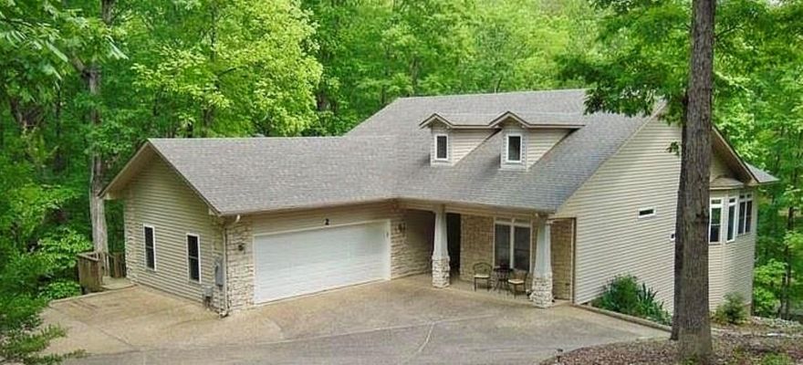 LAKE CORTEZ, WATERFRONT HOME ON NEARLY 2/3 ACRES OF PRIVACY and PANORAMIC VIEWS. Enjoy lake living in this house that has it all: Views, furnishings, and endless entertainment for your guest and love ones.This charming 3 bedroom/2 bath could be your dream find or your wonderful investment property. Step inside and you’re greeted by an inviting living space, perfect for kicking back after a day of adventure. This home has a tile entry, rounded corners, breakfast bar, open kitchen with pantry, updated flooring, gas fireplace, skylight, primary bedroom with jetted tub and huge walk in closet.  Covered boat dock with lift.  Huge area under the house for workshop or to finish as living area.