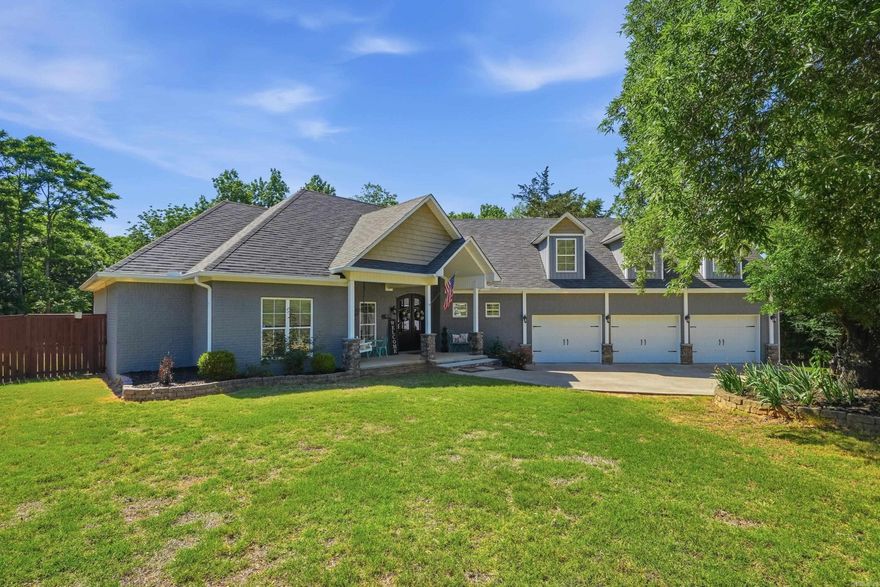 Welcome to 4 Evergreen Cove in Greenbrier, Arkansas, a beautifully maintained home tucked away on nearly an acre in a quiet cul de sac. This home is perfect for buyers searching for spacious homes in Greenbrier AR with a quality finishes, flexible living space, shop, on a large lot. This 4 bedroom, 3.5 bathroom home features an open, split floor plan w/ quality finishes throughout, including custom cabinets, granite kitchen countertops, and extensive crown molding. A stunning two sided fireplace between the living spaces. The oversized primary suite includes double vanities & two closets. The upstairs bonus room w/ ull bath is being used as a bedroom & game room. An office on the main level provides additional flexibility for working from home or hobbies. Enjoy outdoor living on the lg covered back porch overlooking a backyard that backs up to mature trees for added privacy and a peaceful setting. The property also includes a 3 car attached garage plus a 2 car detached shop/garage, giving you plenty of room for vehicles, storage, boats, or projects. Located in the desirable Greenbrier area with top rated schools. Schedule your private showing today and see why this home stands out.