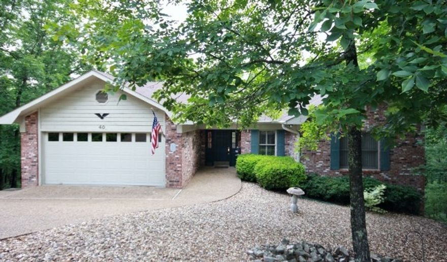 Charming home in fantastic condition! Has the storage & workshop of every man's dream! The 16 x 23 storage room in crawl space leads to an even larger workshop area. Open plan with split bedrooms; Master Bath has dbl vanity, jetted tub, walk-in shower & 2 W-I closets; crown molding in tray ceilings in LR & MBR; DR has a bay window; large deck for outdoor enjoyment. Located in a great neighborhood but some privacy with no house on either side & woods in the back.