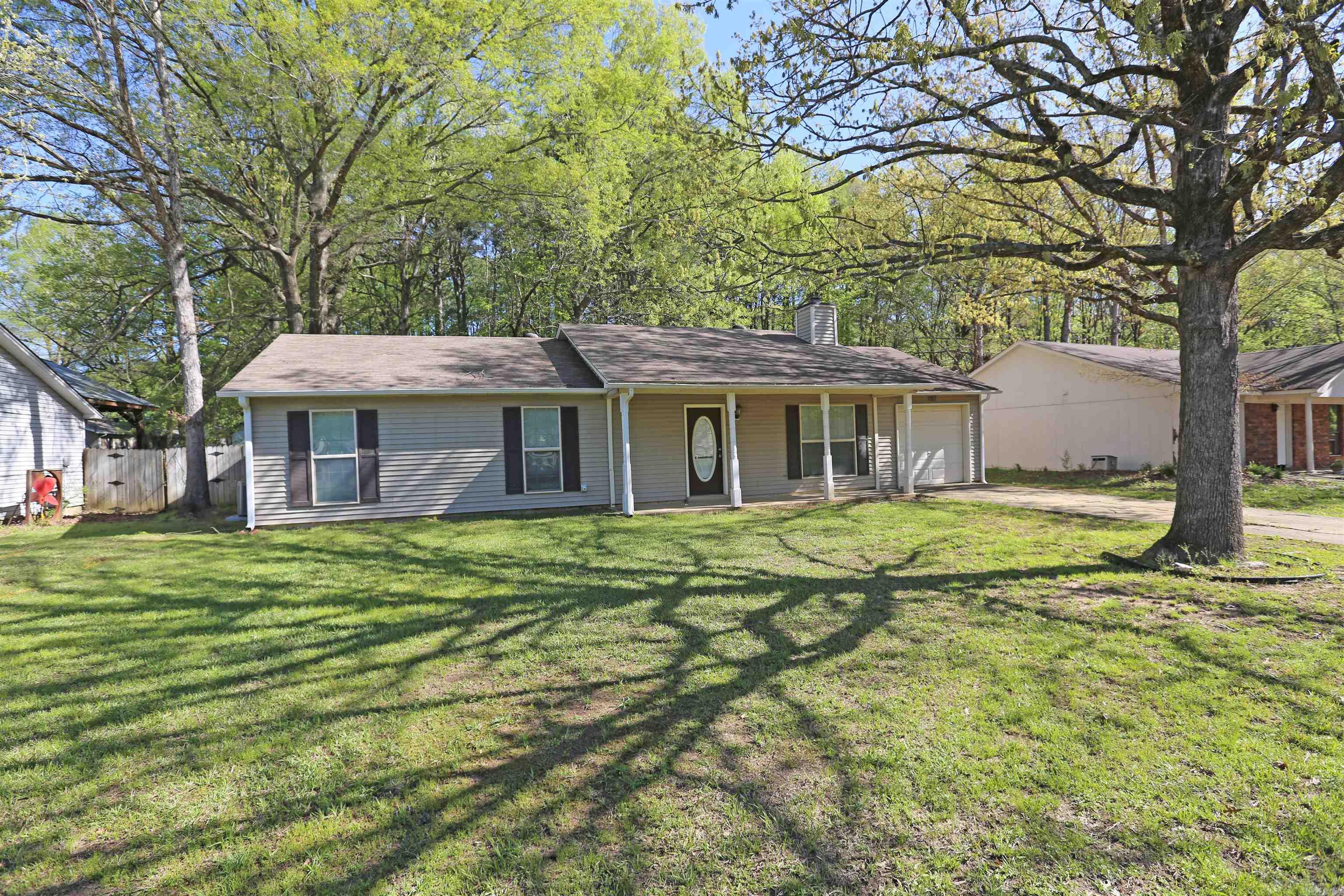 This delightful 3-bedroom, 2-bathroom home offers endless potential and is the perfect starter home in Bryant, Arkansas. Situated in a desirable location, it provides easy access to the interstate, shopping, and dining, making it a convenient choice for any lifestyle. Inside, youāll find spacious rooms with plenty of natural light, providing a warm and inviting atmosphere. The home features a well-sized backyard, perfect for outdoor activities or relaxation. Whether youāre hosting family gatherings or enjoying some quiet time, this backyard has the space to accommodate your needs. With its great layout and ample space, this home is an excellent opportunity for those looking to personalize and make it their own. Donāt miss the chance to own a home with tons of potential in a prime location. Schedule your showing today and discover all that 707 Pattywood has to offer! AGENTS SEE REMARKS.
