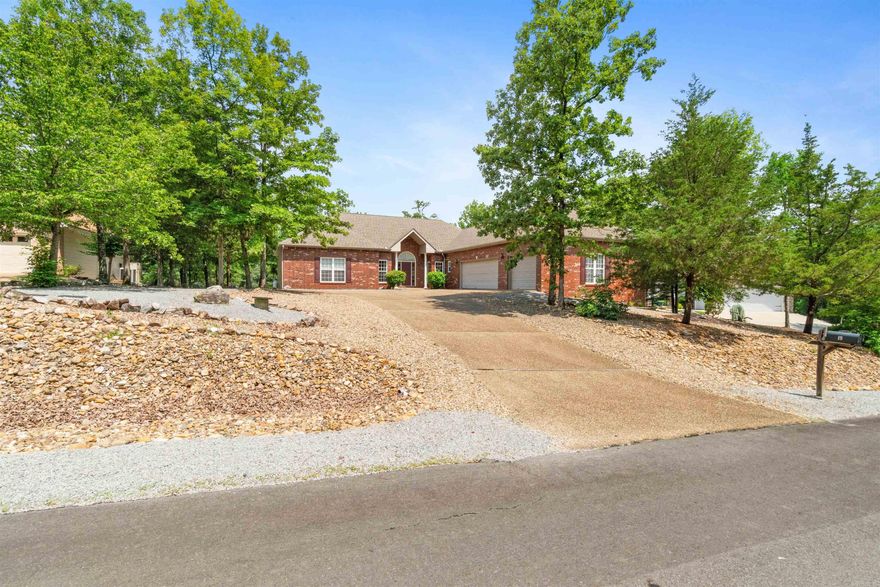 Cooper's Mitchdale plan - a favorite with divided bedrooms plus an office, open plan, raised ceilings, large covered deck, and 3 car side loading garage.  Great exposure on Ponce de Leon Golf Course with near level driveway and low maintenance landscape.  SEE AGENT REMARKS