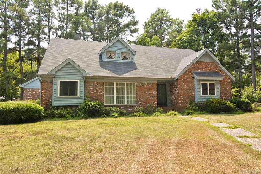 Brick home located on corner lot adjacent to the City Park. Feels like home when walk in the door. Comfortable space, large den with fireplace, formal living and dining room, eat-in kitchen with bay windows. Upstairs has 2 large bedrooms, full bath and floored attic space. Extremely nice screened porch off of den. Great home for growing family.