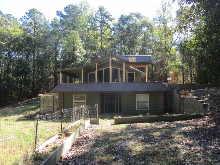 Great opportunity in this very unique 3 bedroom 2 bath, 2 story house on 2.42 acre lot!  Has small greenhouse/planting room beside the house, balcony on the front, patio on rear, nice sized shop beside house as well.  Offers must be submitted by Buyer's agent via res net offer portal, $300 tech fee will apply, agents see conf. remarks for additional info... To submit your buyer's offer, read agent confidential remarks for the offer site and link, and agents please see confidential remarks for additional information.