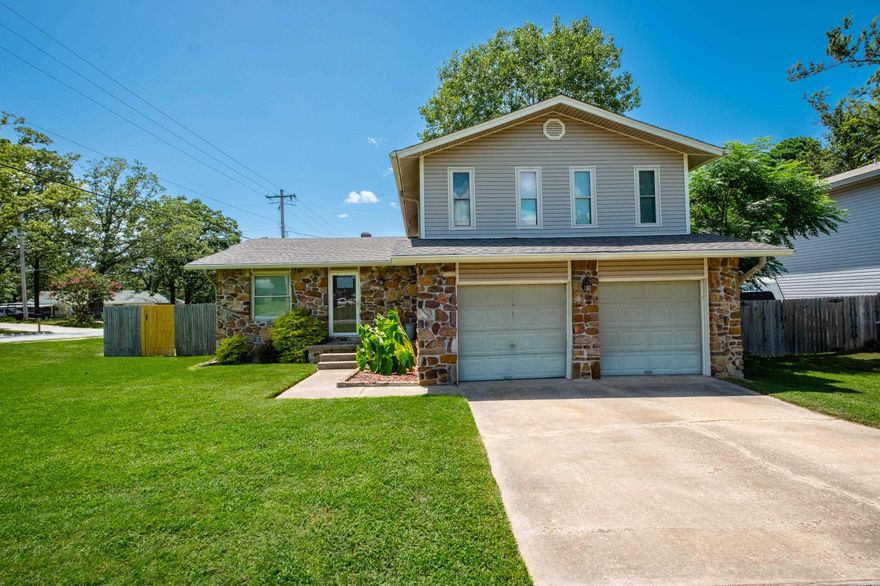 This split level homes its on a large corner lot with fully fenced backyard. Updated Kitchen with granite counters & stainless appliances. Updated bathrooms. Walk in shower in primary bath and walk in closet. Brand new carpet upstairs and LVP in the kitchen. Close proximity to Sherwood’s shopping and restaurants and easy access to the Interstate 167 and Highway 107. Agents see remarks.