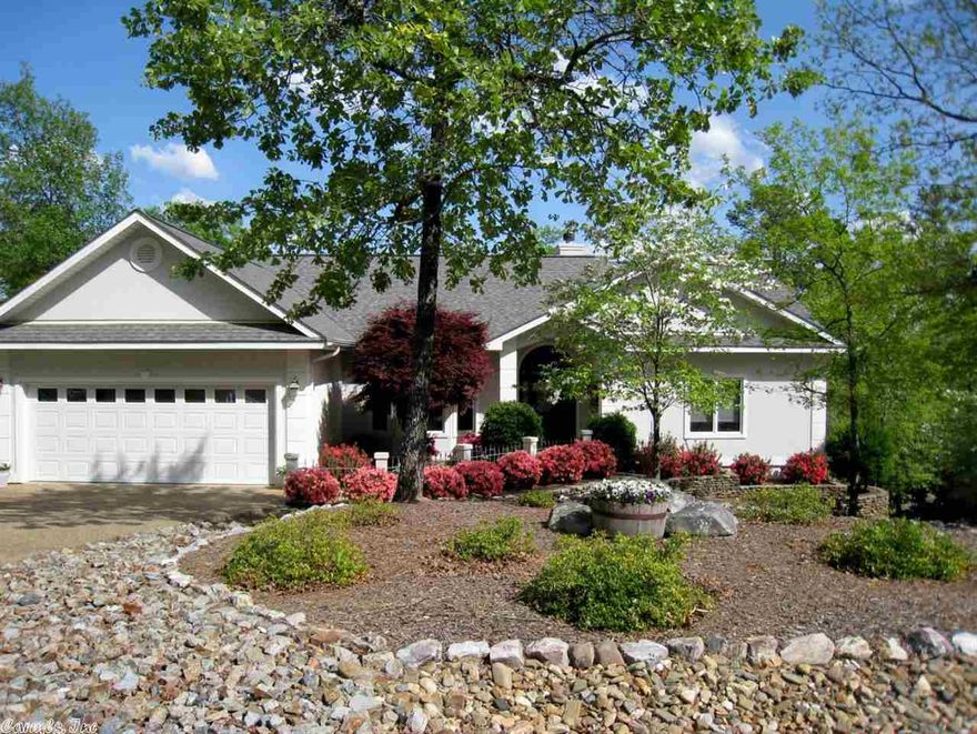 Open the door to this beautiful golf front home and immediately notice the triple vault in the ceiling which allows for the floor to ceiling wall of windows showing off hardwood floors set on an angle in this Cooper Balboa II plan w/modifications. Wonderful master suite includes a vaulted ceiling in the generous master bedroom with two walk in closets, jetted tub, two separate sink areas and a separate water closet. Entertain from the covered trex deck with a view of the pond, green and tee of #7 on Balboa.