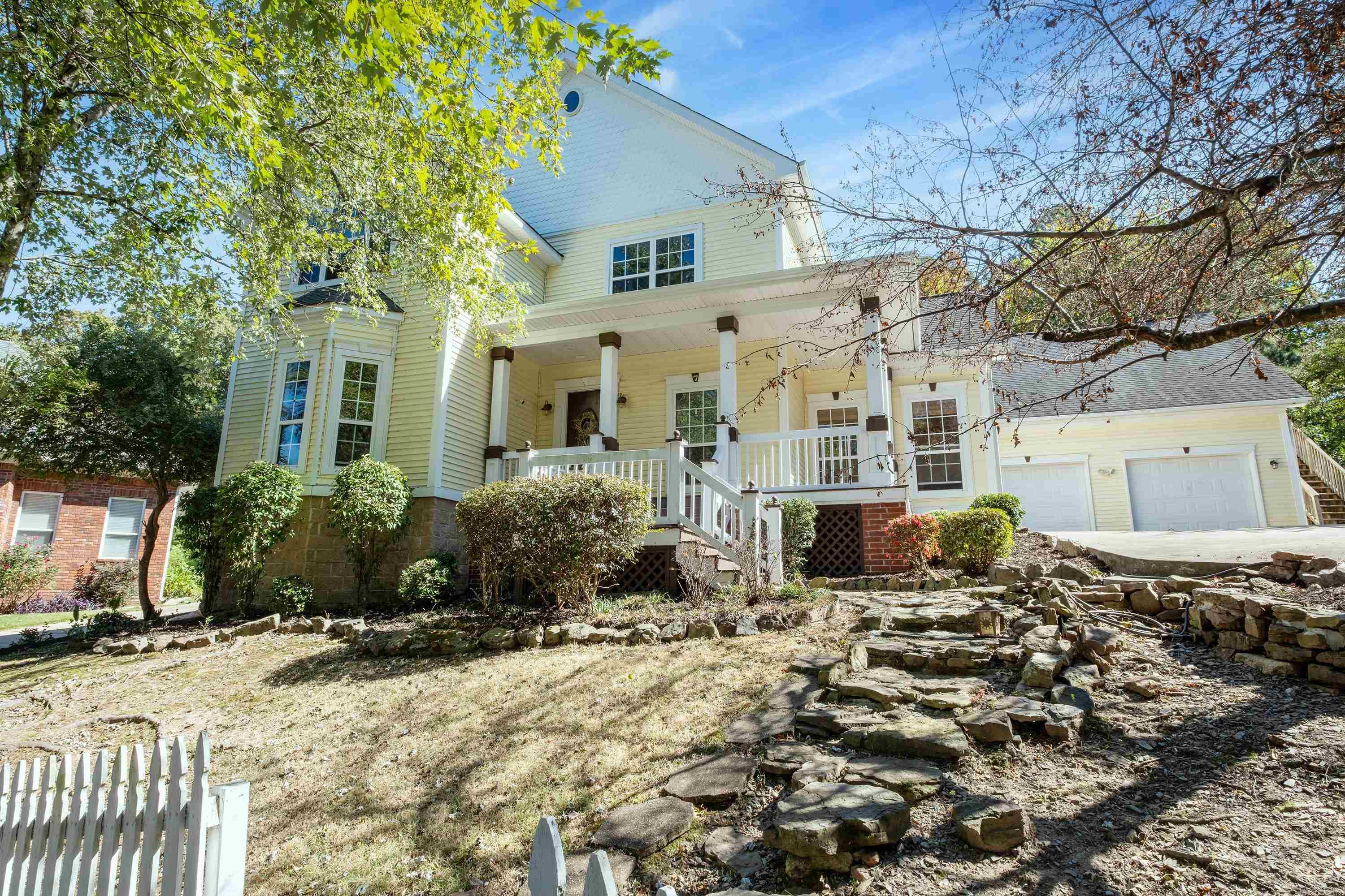 Lots of charm and character found in this Brodie Creek home with high ceilings and wood floors. Fireplace in the living room, primary suite and upstairs bedroom.  Kitchen has island and plenty of cabinets.  Check out the unique kitchen stove. The main level primary bedroom has a fireplace that opens to the spa like bath.  3 bedrooms and bath upstairs.  There's an efficiency apartment upstairs above the garage that's perfect for teens or guests or artist studio. This home just needs a little TLC to be a Southern Living dream. Swimming pool and 2 car garage. Well under market value and in a great neighborhood. Good opportunity to make it yours! Agents see remarks.