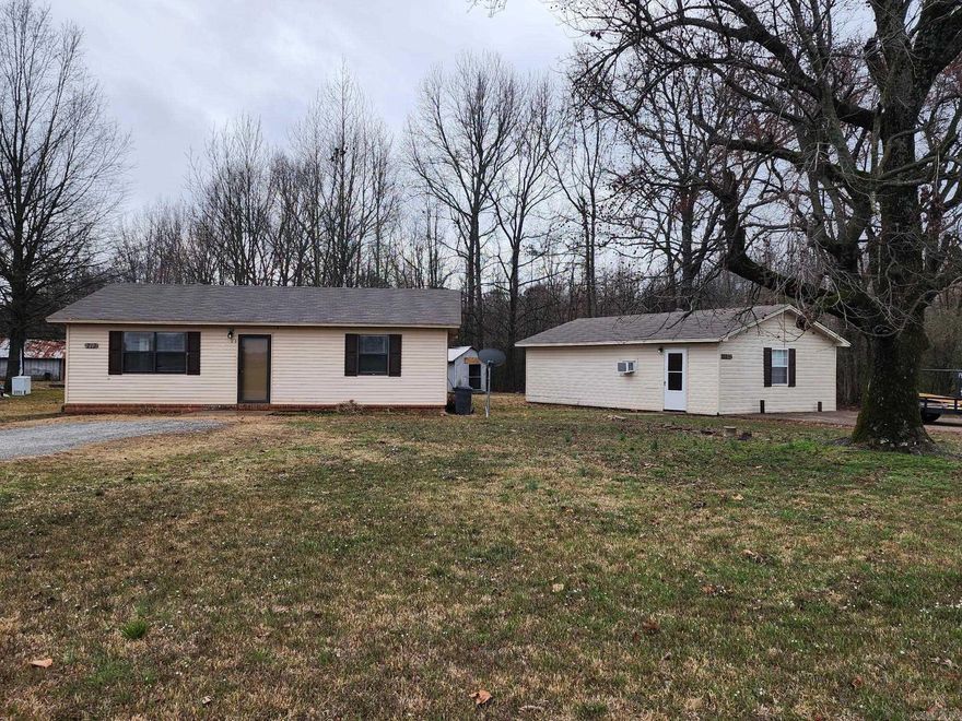 Attention investors! Two rentable 2 bedroom, 1 bath houses on this property. The All-electric larger house (936 Sq Ft) is built on a slab & is wrapped with vinyl & metal siding. The floors are all tile with vinyl in the bathroom The HVAC is Central HVAC. Roof seems to have been replaced in recent years. The smaller house has approx. 550 sq ft house also has a good roof, built on a slab & has window units for AC & central heat. Both have separate drive & utilities. Owner had rented them for $700 & $550 with tenants paying utilities. At a total income of $1,250 month, the property could be a good cash flow, investment or just live in one & rent out the other to help with loan. Only in-house or conventional loans or CASH offers, No FHA, VA or RD loans as property is being sold "As-Is". No seller property disclosure or survey.