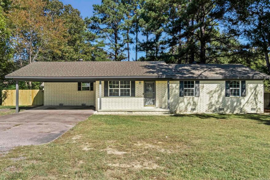 Tucked in a quaint neighborhood, this 3-bedroom, 2-bath home has been beautifully updated. Every corner reflects care and attention to detail, creating a warm, inviting space thatās completely move-in ready. Step inside to a bright and inviting layout that feels both open and cozy. The kitchen includes all appliances (refrigerator stays) and flows nicely into the dining and living spaces, perfect for gatherings and everyday living. There is plenty of cabinet space and storage in this home too!  Enjoy evenings on the covered back patio, overlooking the large fenced-in backyard with plenty of space for kids, pets, or a garden. Two storage sheds outside the fence provide extra room for tools, lawn equipment, or hobbies. The carport adds convenience and protection from the weather. Natural light floods into this home. Imagine decorating this home for the Holidays...How lovely it would be!  The home was renovated in 2024, and upgrades were done including the roof, windows, and a 50-gallon hot water heater per seller. Fresh paint throughout. New mailbox out front! Donāt miss your opportunity to make it yours!