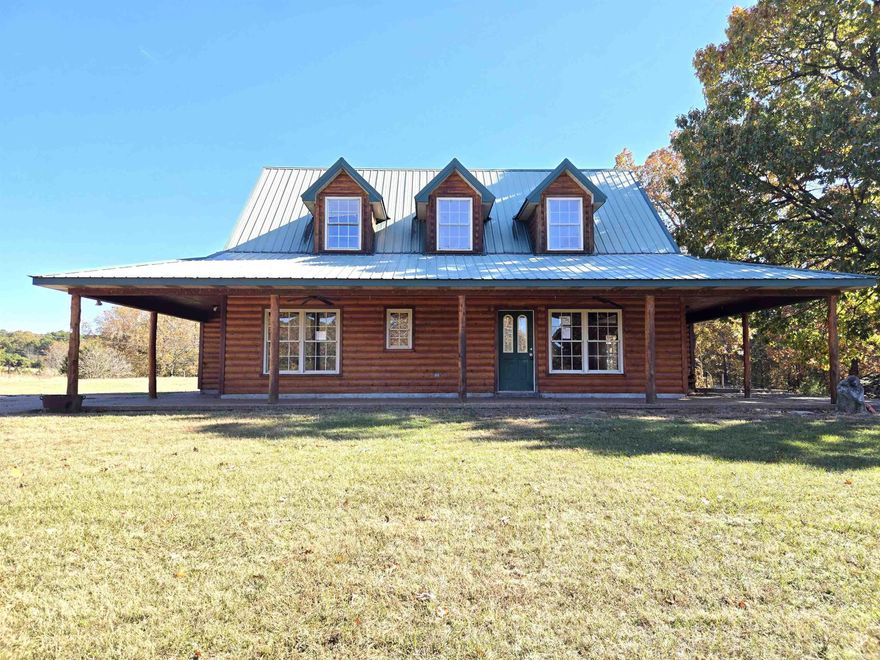 Enjoy the peace and quiet of this log home located on a dead-end street and just down the road from Greers Ferry Lake. This 2-story home features an open floor plan, 2 bedrooms/2 bath down stairs and 1 bedroom/1 bath upstairs and a wrap around porch to sit and enjoy nature. Agents read confidential remarks.