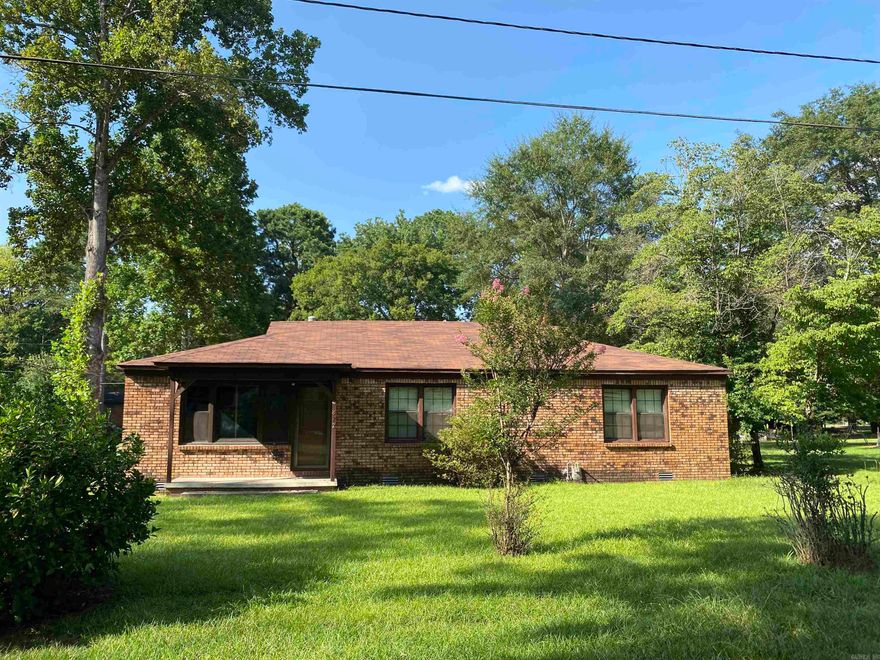 Welcome to 822 Waco St. - your future home base in Camden! This inviting 3-bed, 2-bath residence greets you with a generous front living area that flows into a family room addition anchored by a cozy gas-log fireplace - perfect for movie nights or holiday gatherings. The kitchen and adjoining dining space give cooks and guest plenty of elbow room for weeknight meals or weekend brunches. With solid bones and a smart, livable layout, a few contemporary updates will easily elevate this property into the modern haven you've been dreaming about. Whether you're a first-time buyer eager to put down roots or an investor hunting for a well-situated gem, 822 Waco offers the canvas - bring your style & make it shine!  Being sold "AS IS, WHERE IS". No seller property disclosure is available.