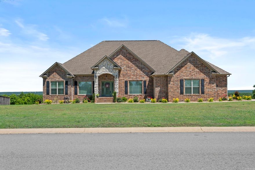 Stunning 4,100 SF custom home in a gated community with views of Seven Point Lake and scenic natural surroundings! Energy-efficient and built for entertaining, it features an open layout, gourmet kitchen, formal dining, vaulted great room, and a spacious deck. Includes 4 bedrooms, each with a private bath, ample storage, and a walkout basement with second living area and full bath. Situated on 1.06 acres with a 2-car garage plus a separate basement-level 1-car garage. Enjoy fishing, kayaking, and walking/riding trails around the 22-acre community lake. Check out the virtual tour!