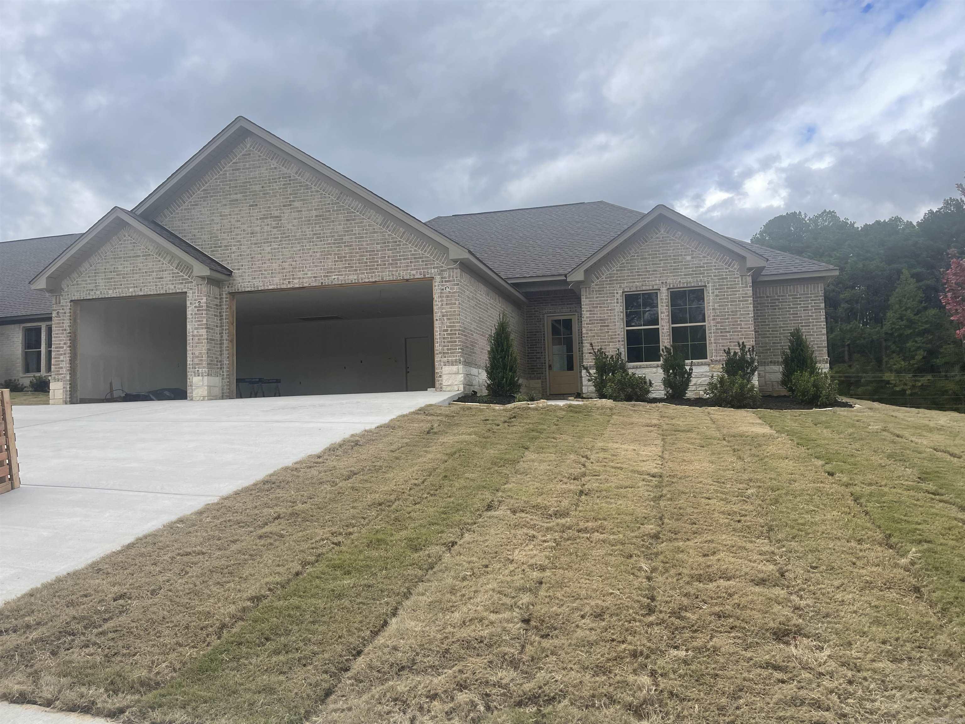 This home has three car garage, Great room over looks kitchen with large island, walk in pantry, custom cabinets. Master has custom ceiling, large master bath with separate vanities . LVP flooring in main area, tile in wet areas.