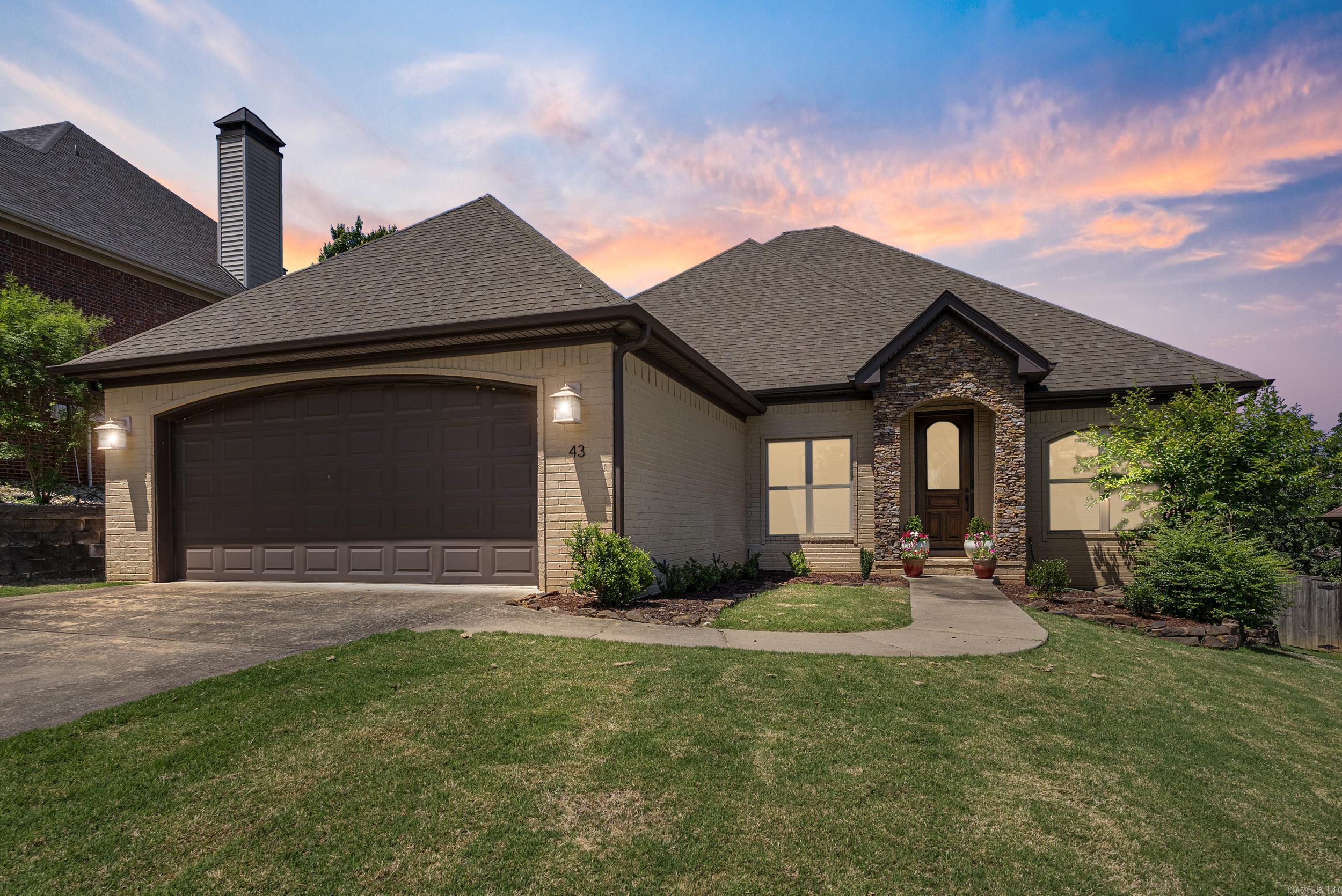 Welcome to this beautifully designed single level home, featuring 3-bedrooms, 2.5 baths and 2,415 square feet of thoughtfully planned living space. Located just minutes from local schools, shopping, and dining, this home offers the perfect blend of comfort, style, and convenience. From the moment you step inside, you’re greeted by a private office just off the entry. The heart of the home is a spacious open-concept living area featuring a cozy fireplace, abundant natural light from large windows, and seamless flow into the kitchen. The kitchen is a true entertainer’s space with a large center island, ample storage, and a dining nook. A separate formal dining room offers additional space for entertaining. The spacious master suite is tucked away for privacy and includes a luxurious en-suite bath with double vanities, a soaking tub, and a separate shower. Two guest bedrooms share a convenient Jack-and-Jill bathroom. Step outside to enjoy the inviting backyard, complete with a deck—ideal for relaxing evenings, outdoor dining, or weekend entertaining. Don’t miss the chance to make it yours!