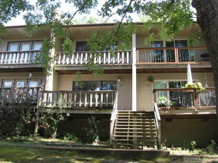 TAKE A LOOK AT THIS GREAT, UPDATED CONDO WITH 2 BEDROOMS AND TWO  BATHROOMS!!!  It's turnkey with all appliances, kitchen items, furniture, decor items, linens included.  Kitchen has new wood cabinets and quartz countertops, stainless refrig/freezer.  Both bathrooms are updated, and lower bath has a shower!!  Flooring is LVP and carpet.  Nice furniture -- K & Q beds, Q sleeper sofa.  All new interior doors,  barn door to conceal laundry center, fans and light kits.  HVAC replaced in 2017.   Ask about the Resort Membership dues and service fees for sewer, garbage service, etc.  Awesome property for residence, and fun getaway, or as a rental.  Very near the Cool Pool & Cafe, tennis/pickleball courts, plus other amenities are an easy drive.  Call today to see!!