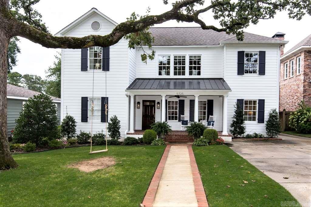 Wonderful Heights property on 60' lot. Master suite on main level w office, formal dining and living rooms, large family room w vaulted ceiling.  Upstairs has 3/4 bedrooms w generous closet space, 3 full full baths, large open playroom. New sewer line , alarm, sprinkler and surveillance cameras. Oversized garage fits 2 large SUVs and golf cart w room for storage.