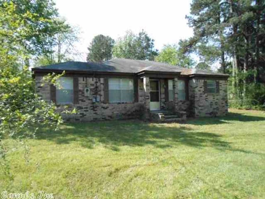 This property is now under auction terms.  All bids are to submitted through www.auction.com    This property is subject to a 5% buyer's premium pursuant to the Auction Terms & Conditions (minimums may apply).  Please contact listing agent for details.   Affordable 3BR brick home near town.  Handyman work needed, but payments much lower than rent.  Large living room and kitchen w/stove, refrigerator. Large backyard.  Offers must include addendums and pre-qual.