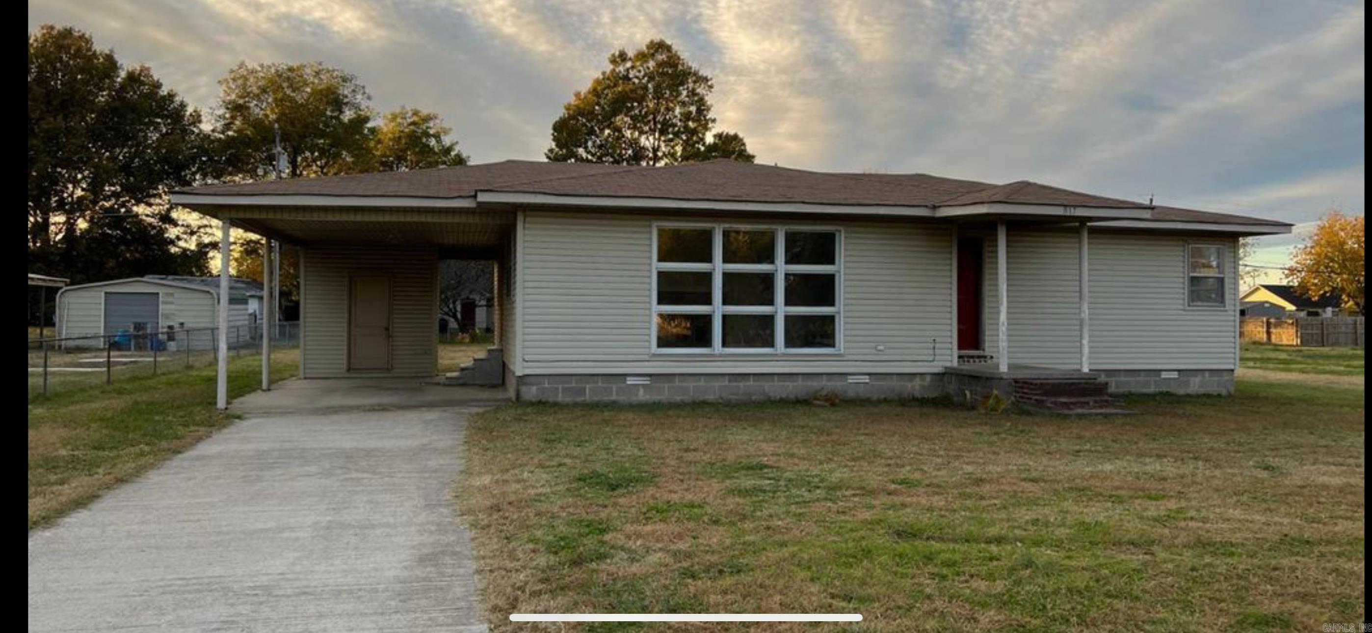 Welcome to Market a great starter/investment home. This home has two bedrooms and one bath. Located centrally in town this home is ideal for a growing family. It also has a very large backyard and storage attached under the carport. Please call today for a showing.