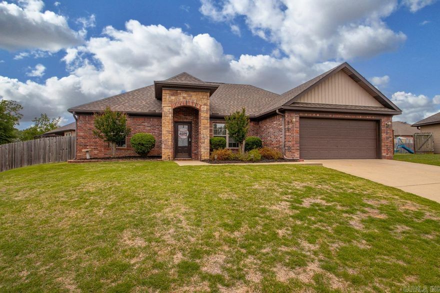 You will not want to miss this incredible opportunity to own a meticulously maintained home in a prime location with easy access to both Little Rock and the Bryant/Benton area. This stunning three-bedroom, two-bathroom residence features a desirable split-bedroom floor plan and a spacious two-car garage. At the heart of the home, you’ll find an expansive, open-concept living, kitchen, and dining area highlighted by soaring raised ceilings and a gourmet kitchen complete with granite countertops and a functional center island. The primary suite serves as a private retreat, offering a massive walk-in closet and a phenomenal ensuite bathroom featuring a deep soaking tub and a separate shower. The secondary bedrooms are generously sized, providing comfort for family or guests. Step outside to your private, fully fenced backyard to enjoy the covered back patio and stylish pergola, perfect for entertaining. With beautiful newer LVP flooring in some areas and a roof replaced in 2024, this turnkey home is ready for you to move in and enjoy!