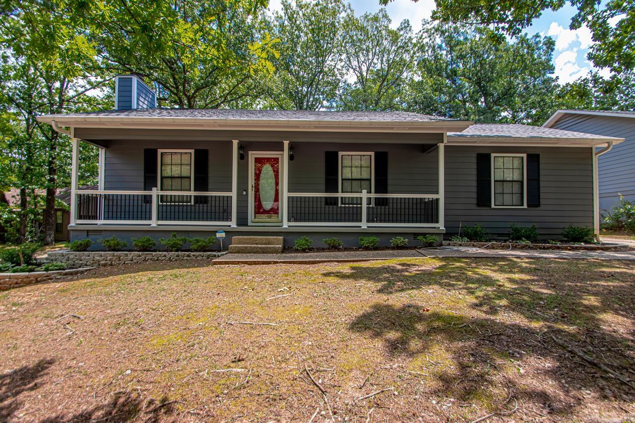 Charming 3-bed, 2-bath home in the desirable Shadow Ridge neighborhood of West Little Rock. This 1,470 sq ft home features a comfortable layout with all bedrooms on one side, a welcoming living area with a fireplace, and a functional kitchen. Enjoy the large back deck, perfect for relaxing or entertaining while overlooking a private backyard. The beautifully landscaped lot includes mature trees, colorful flower beds, and offers excellent curb appeal. Additional features include a 2-car garage, central heat & air, and a convenient location near Chenal Parkway shopping, dining, and parks. Neighborhood pool access included! Square footage approximate please measure.