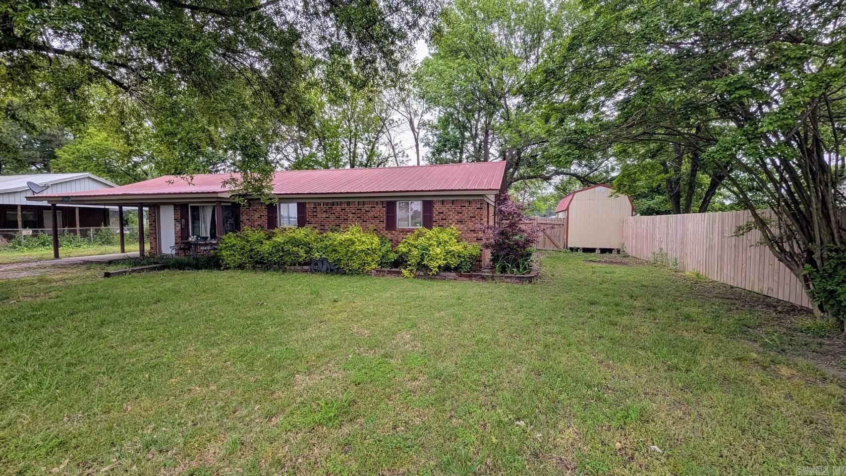 Beautiful 3-bedroom, 2-bath home sitting on 4 lots! 0.69 acres +/- of land. With over 1530 sqft+/- of living space, this home offers ample room for comfortable living. With a great room and a fireplace! This home kitchen offers plenty of ample space for all your needs. HVAC has been updated within the past 5 years, ensuring a modern and efficient heating and cooling system. Don't miss the opportunity to own this lovely property in the Jackson County School District. This property also boasts a 40x40 shop with LED lighting with electric and hot water, complete with a bathroom. featuring a 15-foot raised door, 30 Amp breaker for RV hookup, 220 plug for a welder, Kitchen Sink and Electric range. With sprayed insulation and electric heater, it ensures those wintery days will keep you warm. Don't miss out on the opportunity to own this lovely home with a perfect balance of indoor and outdoor space, ideal for relaxation and entertaining. Remember Don't Buy Or Sell Alone