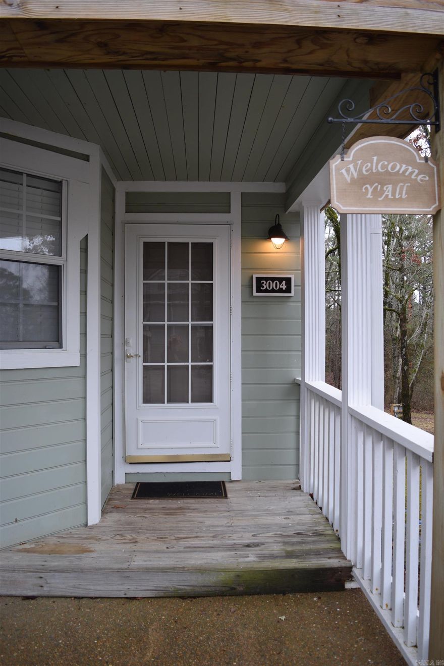 DARLING, UPDATED STUDIO!!  It's a ground-level end unit, with bay windows that allow extra natural light inside!  Very nice furnishings and appliances, decor, etc. that are included at this price!  Updated bathroom also.  Rear deck looks out into wooded area to watch the birds and wildlife!!  Washer/dryer unit is enclosed on the back deck.   Heat and Air is a minisplit unit.   Luxury vinyl floors, counter top range, microwave, refrig, toaster oven/air fryer, and other small appliances.  This makes for a great residence, remote office or studio, a fun getaway for you, or use as an investment property!!  This one is a MUST SEE before you purchase!!