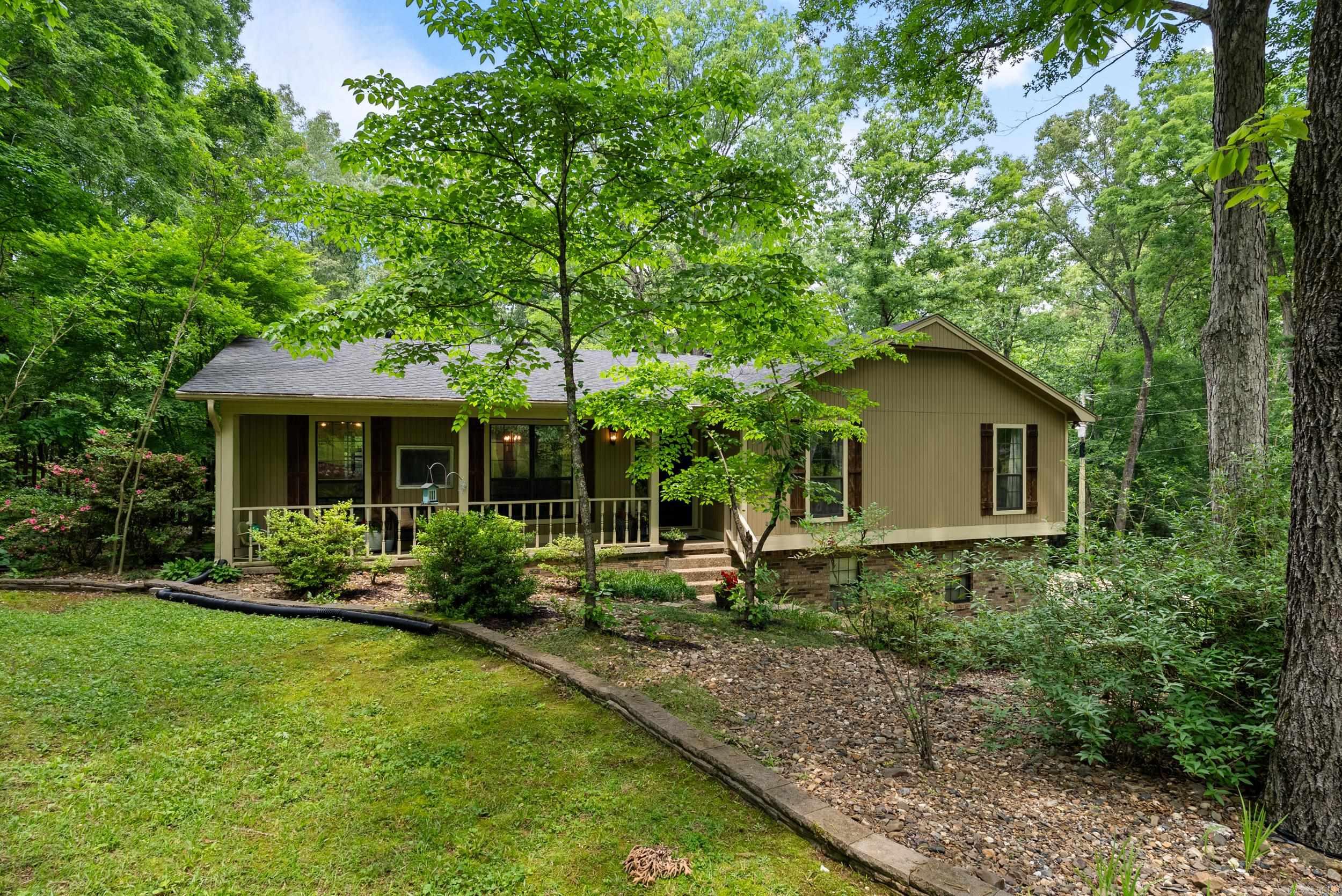 Nestled on 3.68 acres, this beautifully maintained property offers a harmonious balance of rural tranquility and modern convenience. This charming residence boasts 5 generous bedrooms or the option of 4 bedrooms with a versatile room that's perfect for a bonus space. Large living room with brick fireplace and vaulted ceiling, eat in kitchen, formal dining room and an office/study. The home features 2 full baths and an additional half bath. Beautifully landscaped with in-ground pool and hot tub. The two-car garage provides plenty of storage and workshop space. Home has had some recent updates, Roof replaced in 2022, Garage doors and motors replaced 2025, HVAC replaced in 2024, Kitchen appliances updated 2021. This unique property is perfect for those seeking a spacious family home, enjoy nature, and entertain both indoors and out. Don't miss this opportunity to own a slice of paradise in the country while still being close to all the conveniences of town.