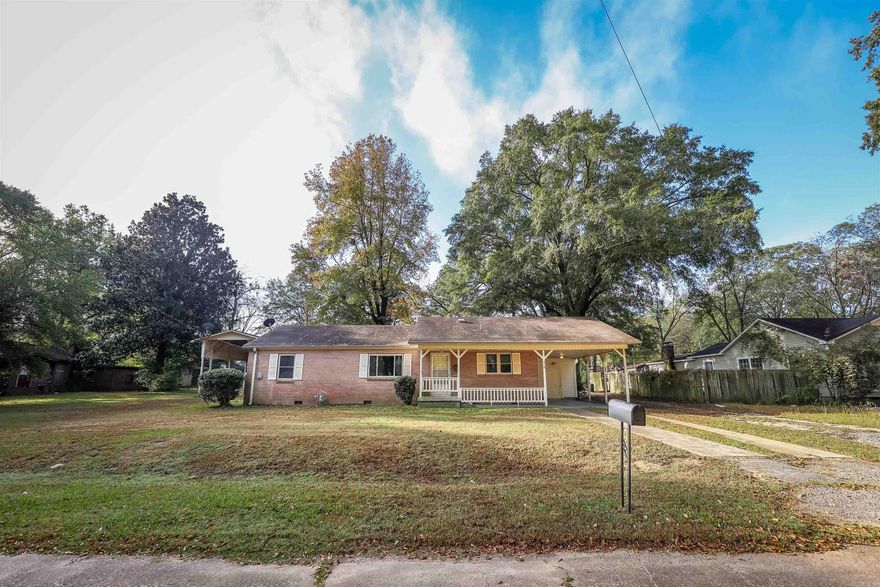 Welcome to this charming brick house in the highly sought-after Fairview area. This delightful 3-bedroom, 2-bathroom home is the perfect blend of comfort and style.   As you step inside, you'll be greeted by the warmth of new windows and flooring, providing a fresh and inviting atmosphere throughout. The spacious yard is a nature lover's dream, offering ample space for outdoor activities and relaxation.   A unique feature of this property is the step-down laundry room, providing convenience and organization for your daily tasks. Additionally, the RV canopy with a 30 amp outlet is a fantastic bonus for those who love to travel and explore, making it easy to park and charge your RV at home.  The covered patio is the ideal spot for enjoying your morning coffee or hosting gatherings with friends and family. Whether you're looking for a peaceful retreat or a place to entertain, this house has it all.  Don't miss the opportunity to make this house your home. Contact us today to schedule a viewing and experience the comfort and convenience this property has to offer.