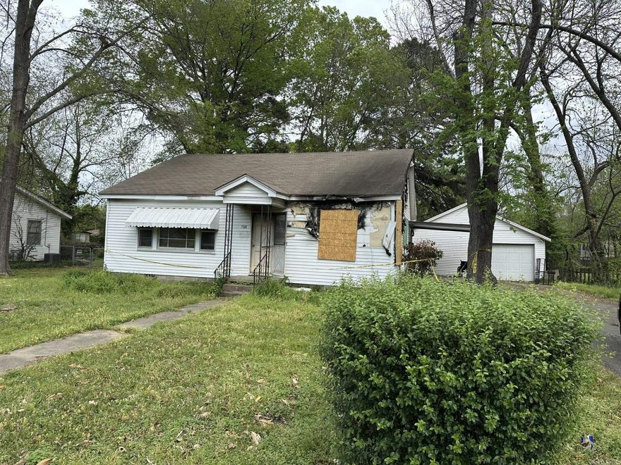 This home is the result of a fire and will be sold "as is."  The insurance company did not deem it as a total loss and says that most is salvageable.  Please know that it is "AS IS". This home was 1248 square feet of living space.  3 bedroom, 2 baths.