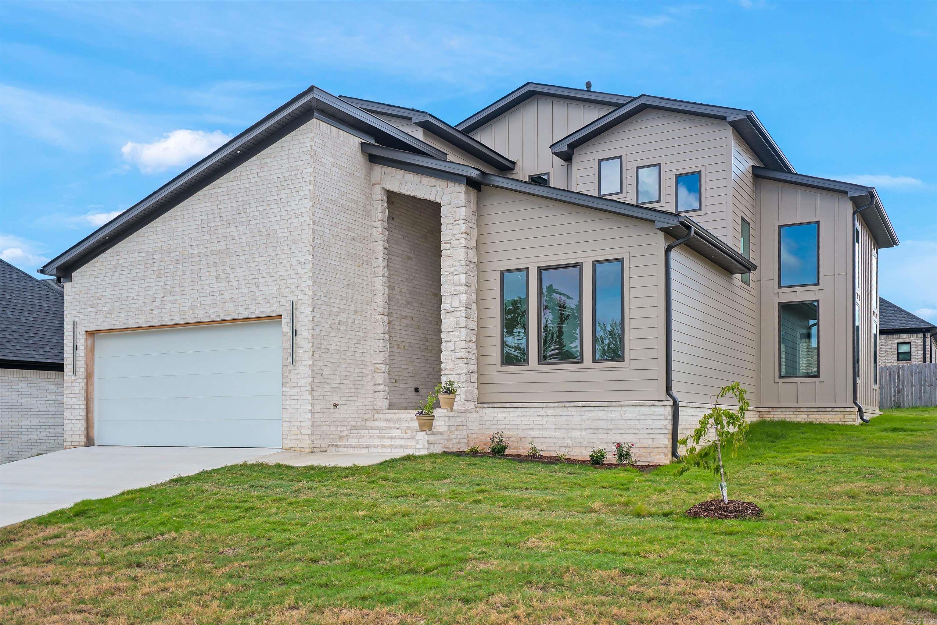 OPEN HOUSE 7/13 from 2-4PM!! Your dream home awaits in Conway's prestigious Sylvia Springs subdivision. This newly constructed two-story residence epitomizes luxury & elegance, offering an unmatched blend of sophisticated design & modern amenities. This home boasts 4 bedrooms, 3.5 bathrooms, & a BONUS room - ideal for remote work, study, or a 5th bedroom! Downstairs, you will be delighted to see the 10' ceilings, walk-in pantry, & the primary bedroom and bath with its expansive walk-in closet & LED, touchscreen mirrors, and a tankless, energy efficient water heater in the spacious laundry room. Upstairs, you will find the guest bedrooms with 9' ceilings and floored attic space for additional storage. The kitchen boasts quartz countertops and a huge, Matisse Leathered Quartzite Island. High-end, GE appliances with Wi-Fi connectivity and touchscreen capabilities complete the look. Don't miss the built-in wine and beverage cooler in the living room and the fireplace! Schedule your private tour!