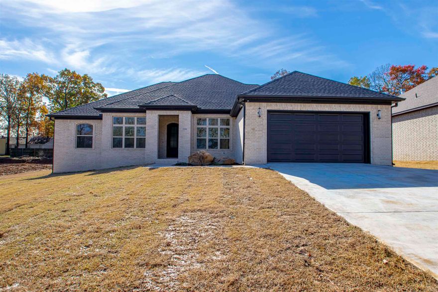 WOW! Show stopper! Your gonna love it! Clean lines! Beautiful lighting! Open concept w/wood beams! Floating shelves beside the fireplace! No carpet! Wood and tile only! This one has a separate dining room! Really nice laundry w/ cubbies for everyone's things! The floorplan is different and wonderful! Primary has a fireplace! Wahoo! Large walk in shower and fabulous soaking tub for relaxing after a long day! This one is a must see! Welcome Home!