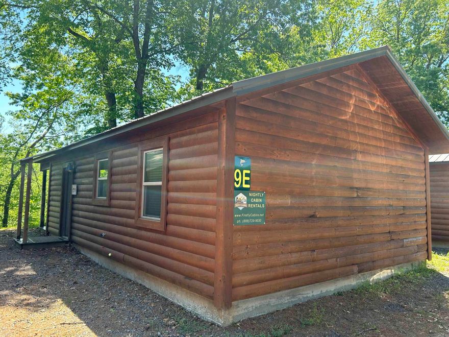 Discover Cabin 9E a riverside luxury and investment property on the pristine Little Red River at Swinging Bridge/Winkley Shoals. This fully furnished 2 bedroom, low maintenance with metal roof and concrete floors, turn-key cabin that offers direct access to a wadable fishing shoal and also includes a private boat slip at the dock—perfect for anglers seeking world-class fishing right at their doorstep when the water is high or low. Nature enthusiasts will be captivated by the abundant wildlife: watch geese, turkeys, blue herons, diversity of ducks, woodpeckers, and rare sightings of trumpeter swans and painted buntings from your serene retreat. Nestled in a tranquil, natural setting, this charming cabin blends rustic appeal with modern convenience, boasting strong income potential for savvy buyers. Enjoy the cool river waters and the convenience of multiple restaurants just a short stroll away. Greers Ferry Lake is less than 7-8 minutes away so plan your vacation accordingly!! Call today to schedule your exclusive showing and secure this exceptional opportunity!