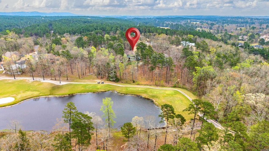 Experience true Golf Front Living in Hot Springs Village on 1.6 acres overlooking Isabella Golf Course Pinta #6 tee and water feature near the East Gate! This beautifully updated 4 bedroom, 3 bath home offers flexibility, privacy, and resort-style appeal just minutes to Lake Balboa, Balboa Marina, pickleball, and multiple golf courses. Fresh paint, granite countertops, updated flooring, and a remodeled primary shower create a move-in ready feel. The main level features two primary suites, open living space, and formal dining. The lower level offers guest suites, full second kitchen, and a large game room/second living area—ideal for multi-generational living, vacation home, or investment property. Enjoy outdoor living with composite decks, patio, stocked koi pond, and iron fenced yard. Oversized 3-car garage adds storage and function. The 4th bedroom with custom built-ins works as an office or hobby space. Rare golf front acreage near East Gate with upgrades and privacy—perfect for retirement home, second home, or nightly rental potential.