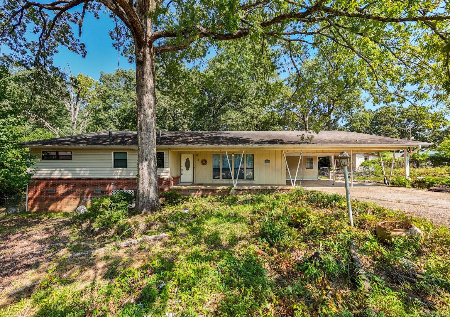Discover an incredible opportunity with this home, perfect for buyers ready to invest in renovations and make it their own. Priced competitively, this property boasts substantial potential for customization and development, featuring a solid foundation and spacious layout that serve as an excellent starting point for your vision. Nestled on a private lot in the desirable West Little Rock, the home is conveniently located near green spaces, enhancing its appeal for outdoor lovers. With 4 bedrooms and the potential to expand to 6, it’s ideal for families or anyone seeking extra living space. The outdoor area also presents exciting possibilities for landscaping and enhancements that can significantly boost curb appeal. This home is a great for those looking to leave their mark and create a personalized living environment. It's a remarkable investment opportunity for anyone eager to embrace the challenge and enjoy the rewards of their hard work. Sold as is. See agent remarks.