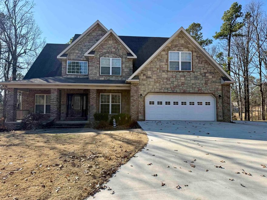 Located in a quiet cul-de-sac on the west side of Paragould, this spacious 5-bedroom, 3.5-bath home offers a versatile layout with room for everyone. A welcoming two-story foyer opens to inviting living spaces filled with natural light and a beautiful stone fireplace. The home features two primary suites—one on the main level and one upstairs. The main-level primary bath includes a custom tiled walk-in shower, while an upstairs bath also offers a walk-in shower.  The kitchen includes a breakfast bar, breakfast area, and flows easily into the formal dining room—perfect for everyday living or entertaining. A dedicated office provides great work-from-home space. Enjoy outdoor living on the new deck, complete with a storm shelter underneath for added peace of mind. A storage building conveys for extra convenience. Situated in an established subdivision, this home offers comfort, flexibility, and a great location.  With an acceptable offer, the Speed Queen washer and dryer may also convey!