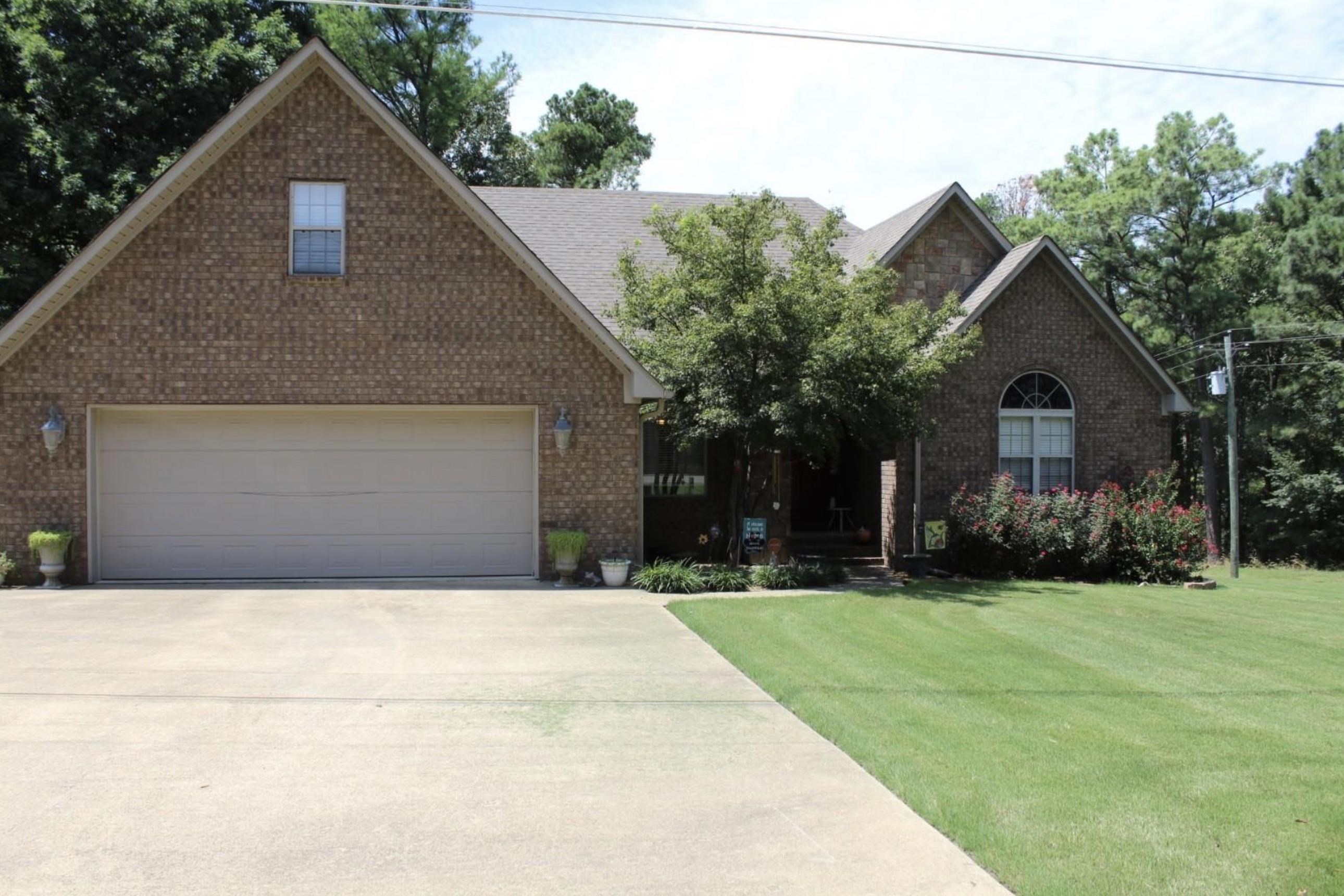 Schedule your appointment to see this 2,594 square feet brick home built in 2009 and located on Peterson Drive. The main level has a split floor plan with 3 large bedrooms and 2 baths. The open floor plan provides separate dining and breakfast areas, living area, kitchen and utility room. The spacious primary suite has a connecting bathroom with large tub, separate shower, dual sinks and walk-in closet. This home has a finished upper level, great for an extra bedroom, exercise room or office. A sun room situated on the rear of the home opens up to a large deck providing an indoor and outdoor space to relax. The sun room and deck overlook the woods where deer often roam. The roof was replaced in 2023.