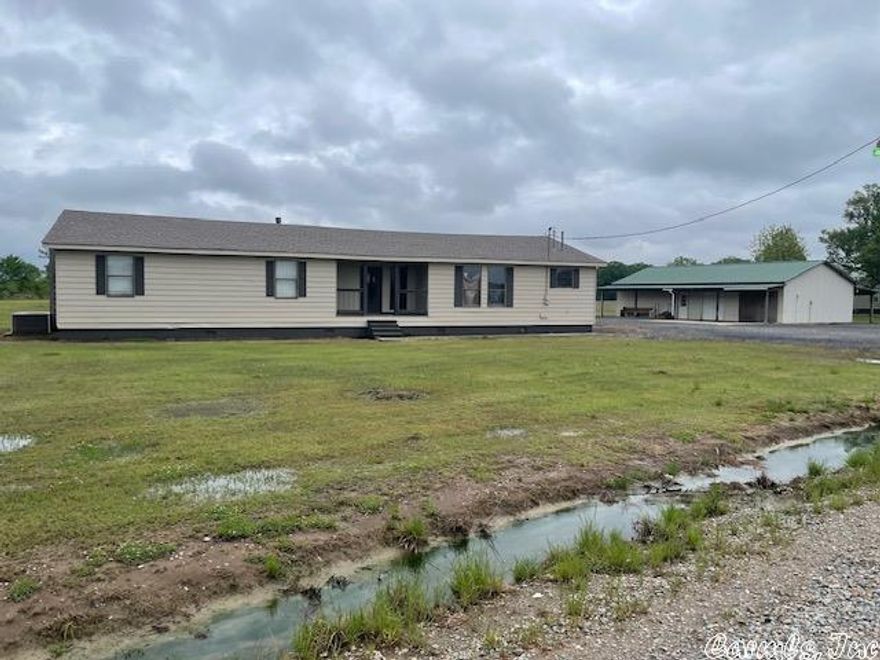 Bayou Meto. Great opportunity to have your own duck club at a reasonable price. Located just minutes from Bayou Meto reserve. Move In Ready with 4 bedrooms and 2 1/2 baths. Central H/AC . Updated with "Rustic Look" throughout the home. Back patio off the Kitchen. Very nice 1,344 sq. ft. metal shop perfect for storing hunting equipment and Rangers. Nice gravel for plenty of parking. Rural water system.  Complete house-hold furniture including beds and kitchen equipment sold separately.