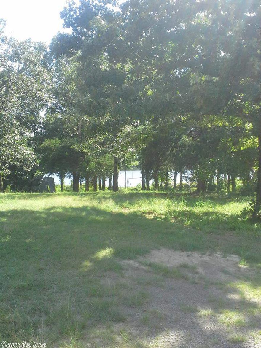 AWESOME POTENTIAL FOR LAKE HOME OR GET-AWAY CABIN WITH MINIMAL INVESTMENT TO CREATE YOUR OWN RELAXING RETREAT,ESCAPING THE HUSTLE & BUSTLE OF CITY LIFE & ENJOYING BEAUTIFUL MOUNTAINS, VIEWING WILDLIFE,NATURAL WATER SPRINGS & FISHING ON ARKANSAS'S LAKE BARNETT.A MUST SEE! MOTIVATED SELLER!