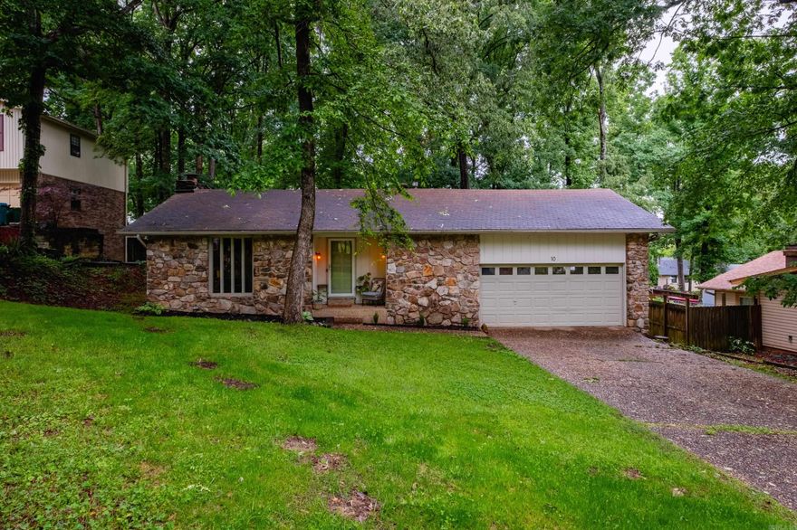 Great new home tucked away on a quiet cul-de-sac - This three bedroom, two full bath home is move in ready and full of charm. Large living room with a gorgeous stone fireplace, vaulted ceiling and wood beams that bring all the character. Newly updated kitchen and bathrooms, all new flooring, new interior and exterior paint. Huge laundry room plus a great deck overlooking a massive fully fenced backyard with beautiful trees. This home feels good the minute you walk in. New water line from main to the house and new sewer line. Neighborhood pool opening this summer! Come see!