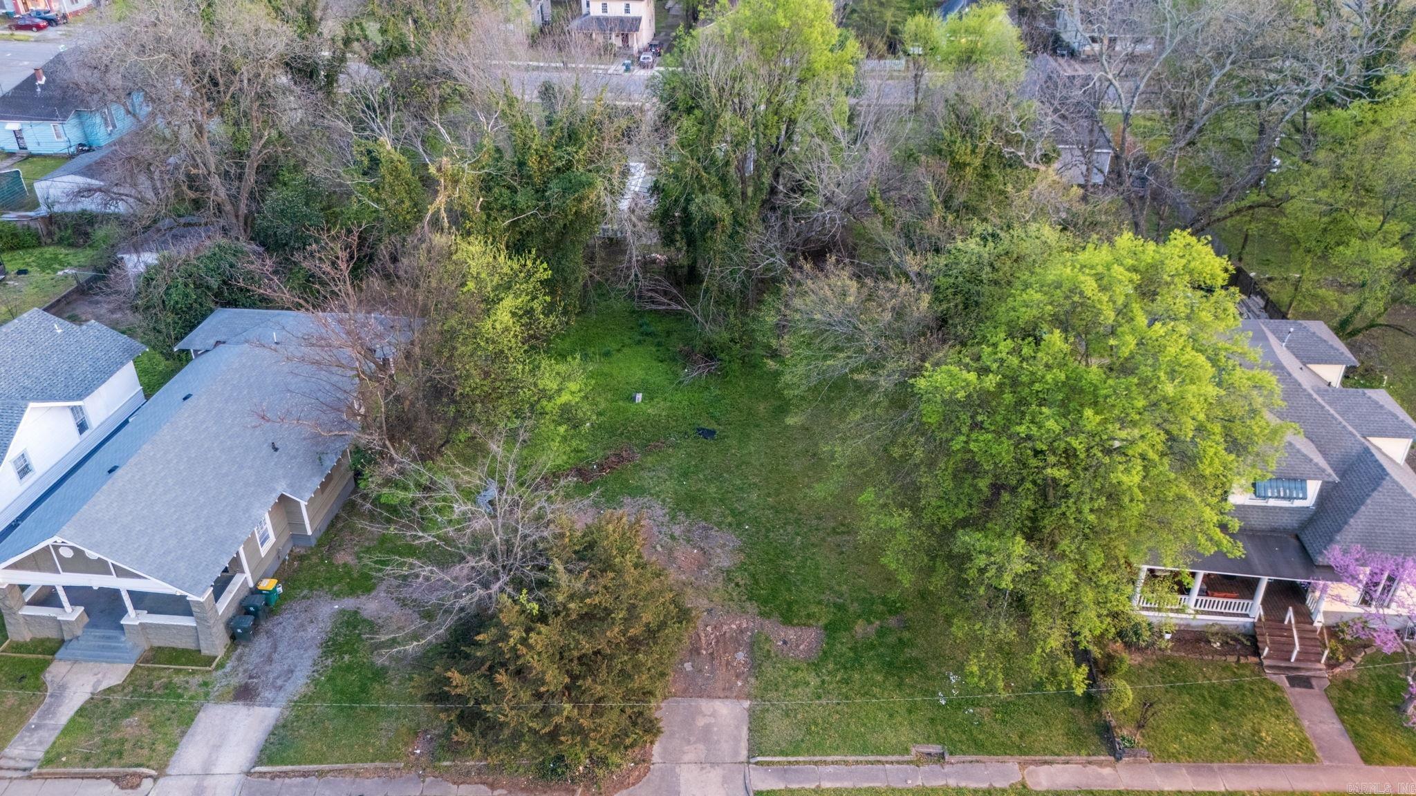 Located in the Beautiful Central High School Neighborhood Historic District in Little Rock. This property combines itself of two leveled lots. Rather if you're looking to build or host family gatherings this property is one of a kind with endless possibilities. Conveniently located off I-630 and next to the bus line this property is ready to meet your needs and Perfect for investors or future homeowners.