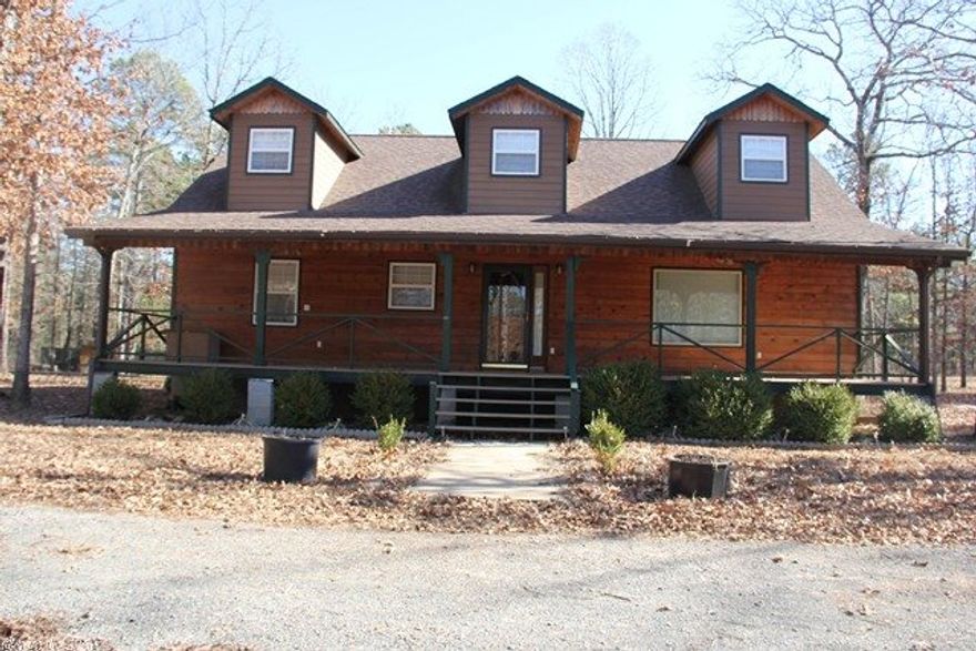 Beautiful country home featuring 4 brs. 2 baths, very private setting is located on 2 acres only 2.1 miles to the South Fork paved launching ramp on Greers Ferry Lake.  1 mile to the Sills dirt boat ramp.  Backyard is fenced. Detached 20x26 detached shop and garage, plus 14x26 carport attached & 16x16 carport, which can be used as boat or tractor shed.  Front covered porch across front of home with great views.  Two bedrooms and bath on the upper level with large room between bedrooms. See docs.for more inf