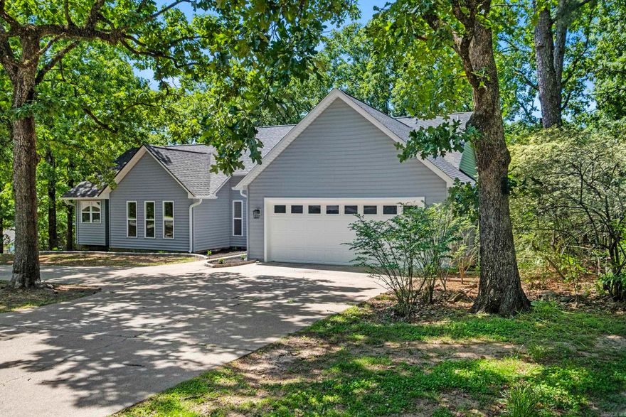 Totally remodeled and like new. Sitting on a beautiful, tree covered, 1 acre lot right in the heart of Cabot. Great location with easy access to shopping and freeway in just minutes. New flooring, light fixtures, plumbing fixtures, HVAC, Water Heater, Roof, cabinets, SS appliances, LVP flooring, windows and doors, trim...and more, all new! Kitchen features quartz counters, wall convection oven, lazy susan cabinets. Cabinets have soft close door and drawers. Two private decks that overlook the huge yard. The garage will fit even the biggest SUV or truck with room to spare. Master bath has a twin sink vanity and a big walk in tile shower. Master bedroom has a door that leads to its own private deck. Come check this one out today.  AGENTS: SEE REMARKS